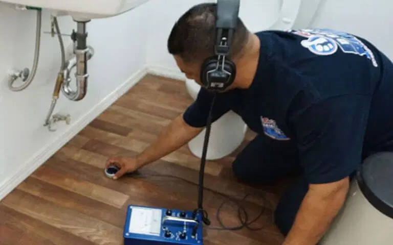 Professional technician checking water Moisture